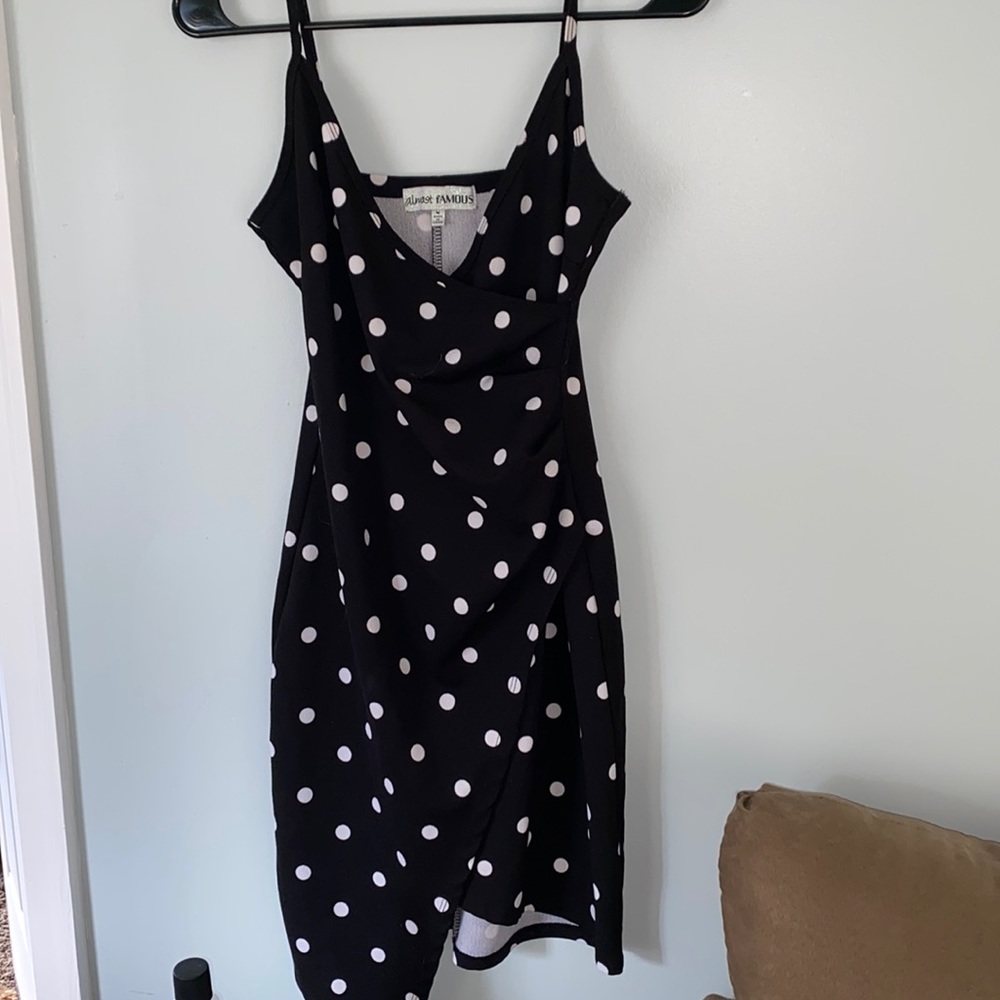 Small black and white polkadot asymmetrical dress